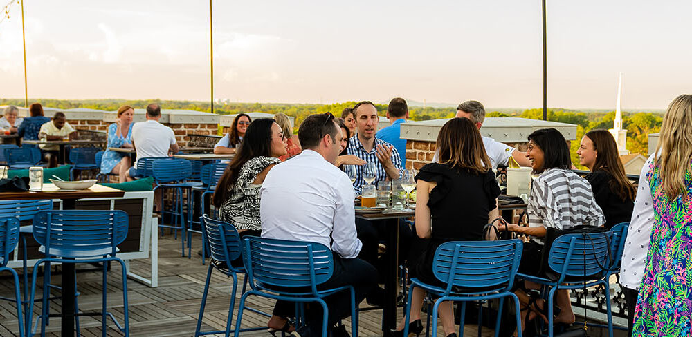 Guests dining on the roof at UP on the Roof Alpharetta