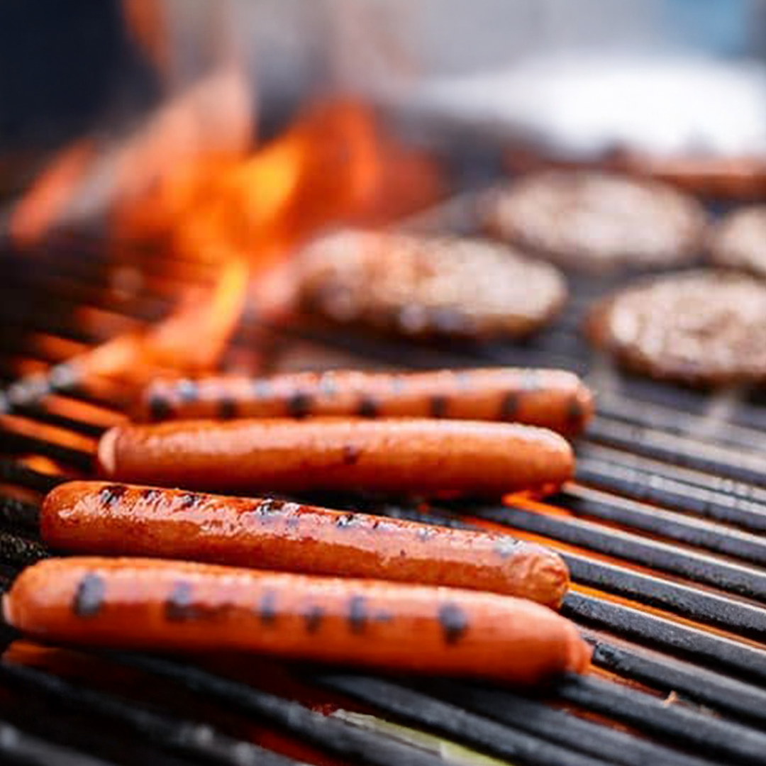 Hot dogs and hamburgers on the grill